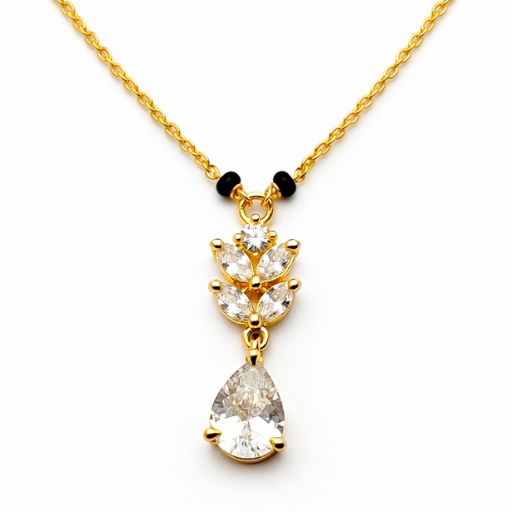 Blending botanical grace with sacred tradition, this gold-toned Mangalsutra features a stunning tiered leaf motif and a high-wattage crystal drop. It is a sophisticated signature piece designed for the modern woman who loves timeless, radiant details.