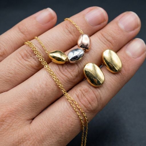 Embrace the ultimate expression of organic minimalism with this impeccably crafted tri-tone necklace. Featuring a masterclass in sculptural fluidity and metallic harmony, this piece offers a sophisticated "pebble" silhouette that reimagines natural forms into a high-fashion statement.